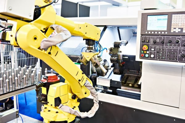 CNC machine tending robotic arm_276513545