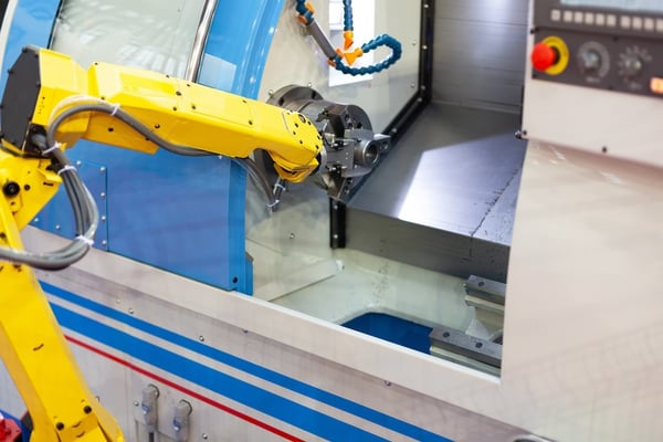 machine tending robotic arm_337691353